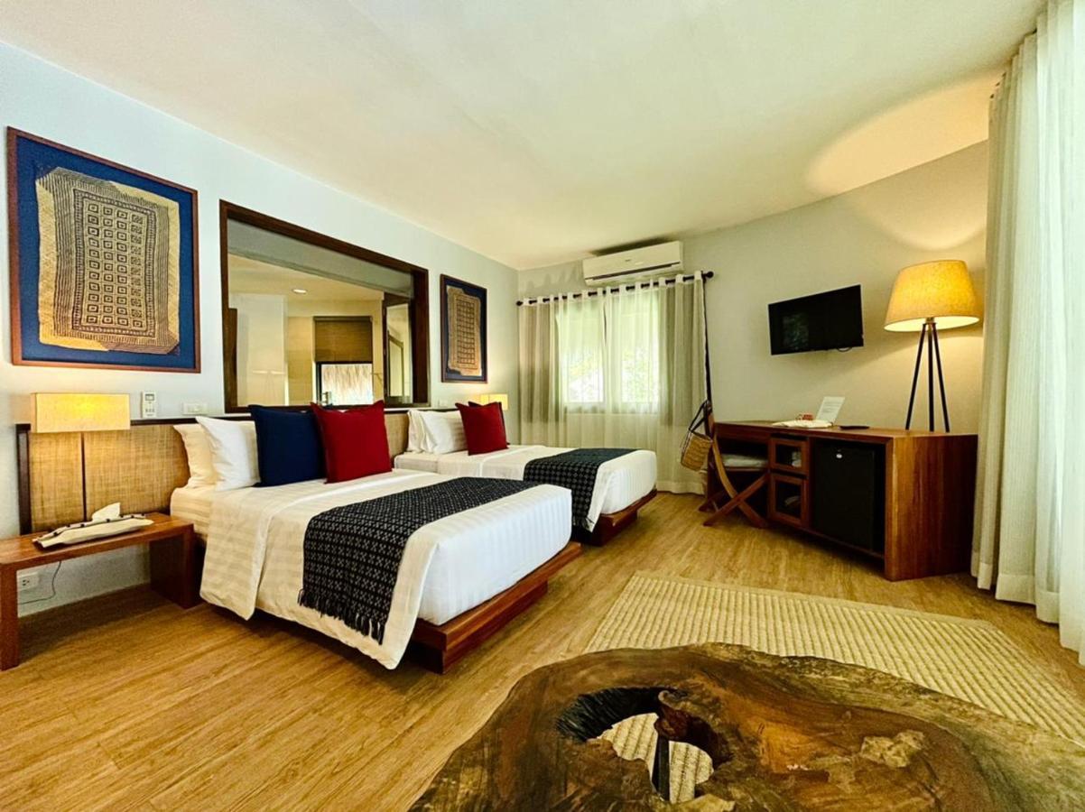 Amun Ini Beach Resort & Spa Анда Екстериор снимка