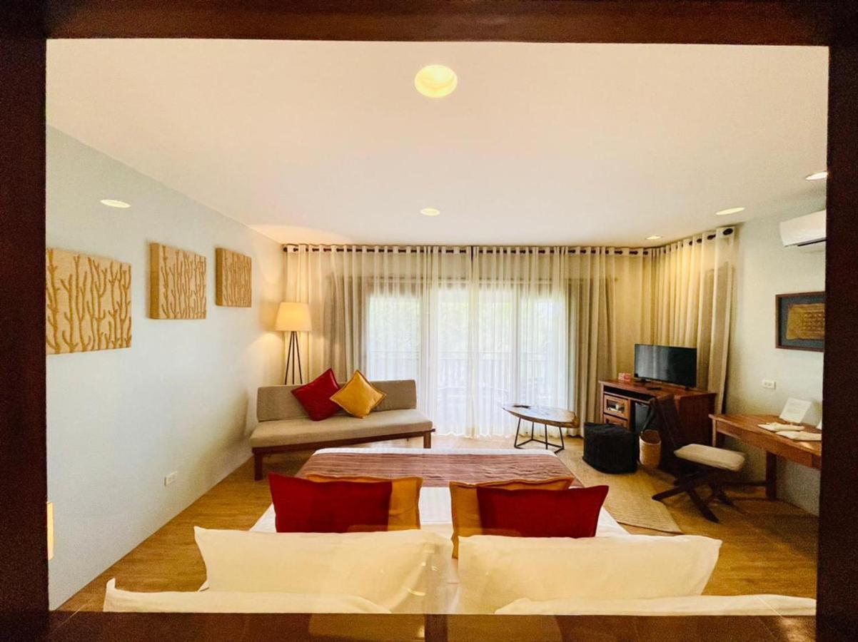 Amun Ini Beach Resort & Spa Анда Екстериор снимка